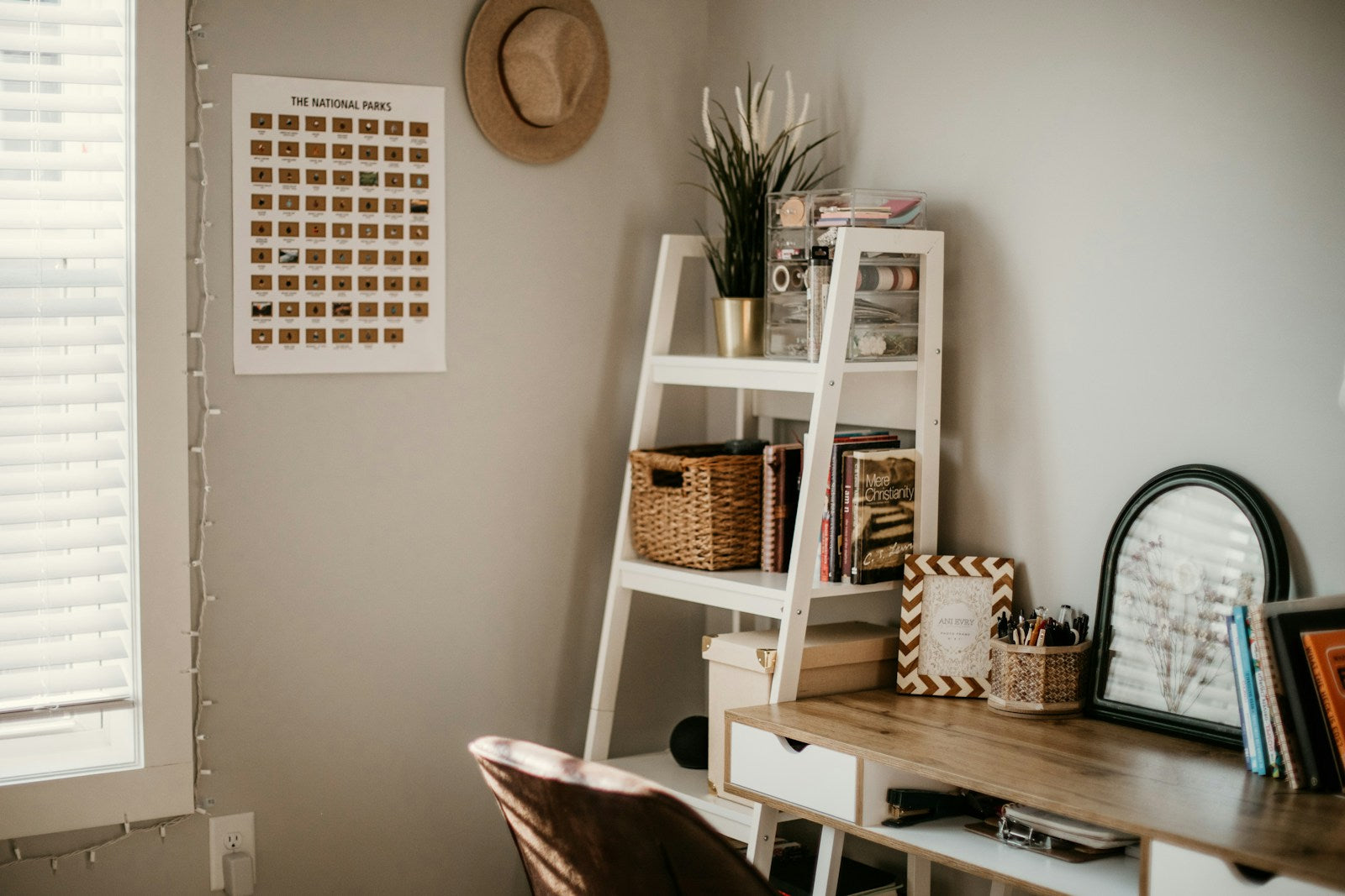 Organised shelf with books and a woven basket